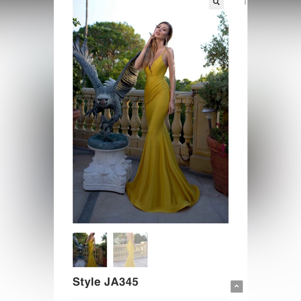 A Jessica Angel gown in size Small (2-4) in Hunter Green